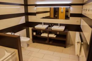 Koupelna v ubytování Hotel 4x4