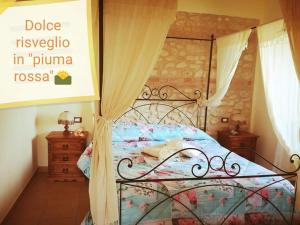 Postel nebo postele na pokoji v ubytování Il Poggio Dei Pettirossi