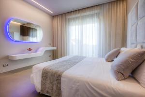 Postel nebo postele na pokoji v ubytování Hotel Nettuno