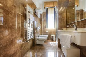 Koupelna v ubytování Hotel Nettuno