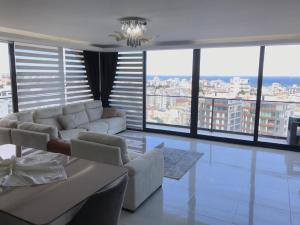 Гостиная зона в Karia Plus City Apartments