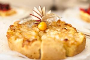 a piece of food with a pineapple on top of it at Hotel Nettuno in Cervia