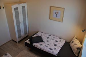 Postel nebo postele na pokoji v ubytování Egilsstaðir 1 Guesthouse