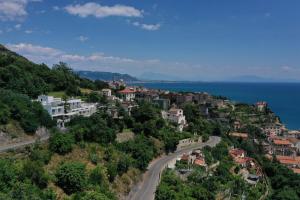 a scenic view of a city with houses and trees at Relais Paradiso in Vietri sul Mare