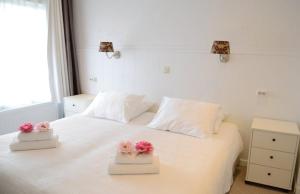Voodi või voodid majutusasutuse Hotel 't Witte Huys Scheveningen toas