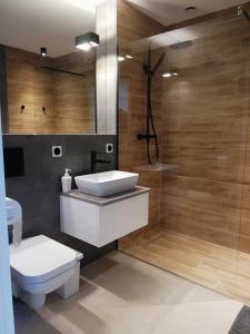 Kúpeľňa v ubytovaní Sport Rooms II Chodakowska Warszawa
