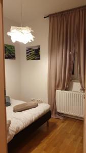 Postel nebo postele na pokoji v ubytování Apartman Zoe