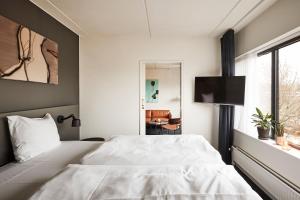 Letto o letti in una camera di Comwell Kolding