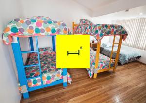 Postel nebo postele na pokoji v ubytování AlterNative Hostels
