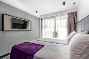 Postel nebo postele na pokoji v ubytování Hotel Ad Turres