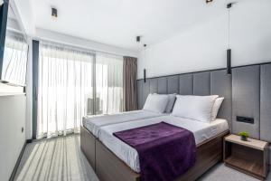 Postel nebo postele na pokoji v ubytování Hotel Ad Turres