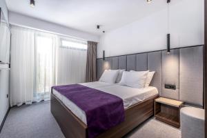Postel nebo postele na pokoji v ubytování Hotel Ad Turres