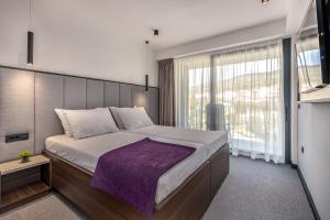 Postel nebo postele na pokoji v ubytování Hotel Ad Turres