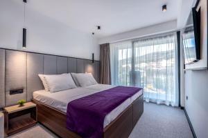 Postel nebo postele na pokoji v ubytování Hotel Ad Turres