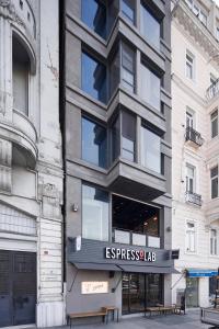a building with a sign that reads espressed slab at Stay Lab Residence & Hotel in Istanbul
