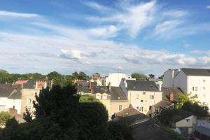 a view of a city with houses and roofs at Le Convivial Ethnique-Pont Rousseau studio T1bis in Rezé