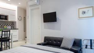 En eller flere senger på et rom på Interno 1 Ciampino Roma Luxury Apartment