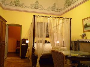 Postel nebo postele na pokoji v ubytování Albergo Ristorante Cavallo Bianco