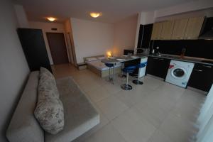 A kitchen or kitchenette at Menada Grand Kamelia Apartments