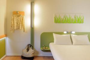 Ein Bett oder Betten in einem Zimmer der Unterkunft Ibis budget Wien Sankt Marx