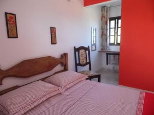 Ένα ή περισσότερα κρεβάτια σε δωμάτιο στο Maison Aires Malcher