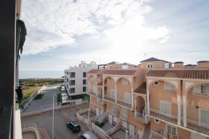 a view from a window of a building at 58 Luxury Sunny Vacations in La Mata