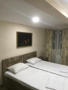 Postel nebo postele na pokoji v ubytování Appartment in heart of tbilisi