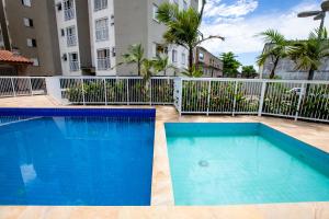 Swimmingpoolen hos eller tæt på Jardim das Palmeiras, piscinas, lazer, estacionamento coberto, prox. Praia Grande