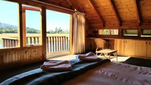 Ліжко або ліжка в номері Pirates Creek Self-Catering Chalets