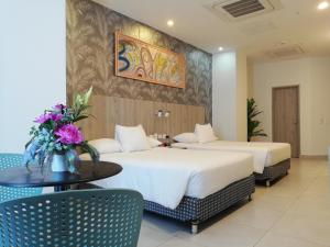 Postel nebo postele na pokoji v ubytování Hotel Zi One Luxury