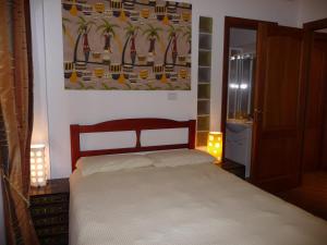 Posteľ alebo postele v izbe v ubytovaní Doria Suites