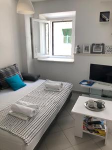 TV a/nebo společenská místnost v ubytování Apartment Estera