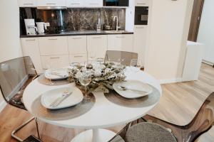 Posedenie v ubytovaní Apartament Silence Triventi Szmaragd