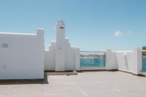 a view of the city from the top of a building at Casa Santorini Terrace in Arraial do Cabo