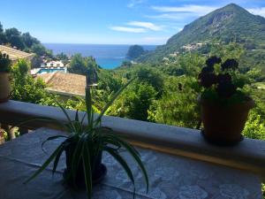 Foto de la galería de Ermones Odyssesas Bungalow en Vátos