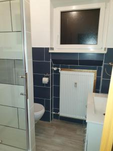 Ein Badezimmer in der Unterkunft Aventur Studio 212 Am Rotharrsteig