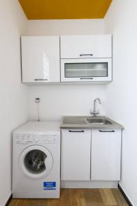 Kuchyň nebo kuchyňský kout v ubytování Amaze Residence luxury 2bedroom apartment 1