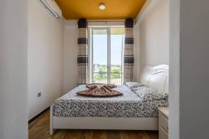 Postel nebo postele na pokoji v ubytování Amaze Residence luxury 2bedroom apartment 1