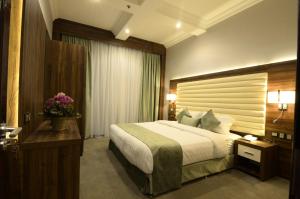 Cama o camas de una habitación en Dunes Hotel