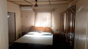 Katil atau katil-katil dalam bilik di Brufut Residence