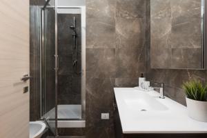 Ванная комната в Lovely Rome Apartments