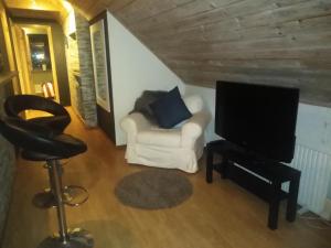 A television and/or entertainment centre at Roliga semestrar i Åhus!