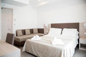 Postel nebo postele na pokoji v ubytování Hotel Solemare - Frontemare - 3 Stelle Superior