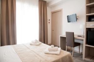 Postel nebo postele na pokoji v ubytování Hotel Solemare - Frontemare - 3 Stelle Superior