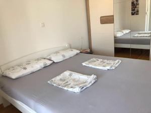 Postel nebo postele na pokoji v ubytování Apartman DODO 1