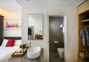 Ett badrum på ibis Melbourne Central