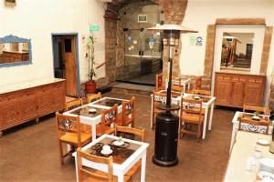 Um restaurante ou outro lugar para comer em Posada Villa Mayor