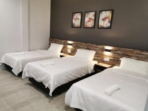 Voodi või voodid majutusasutuse L Hotel toas