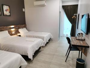 Voodi või voodid majutusasutuse L Hotel toas