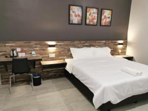 Voodi või voodid majutusasutuse L Hotel toas